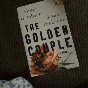 The Golden Couple Novel by Greer Hendricks and Sarah Pekkanen - Brown Cover